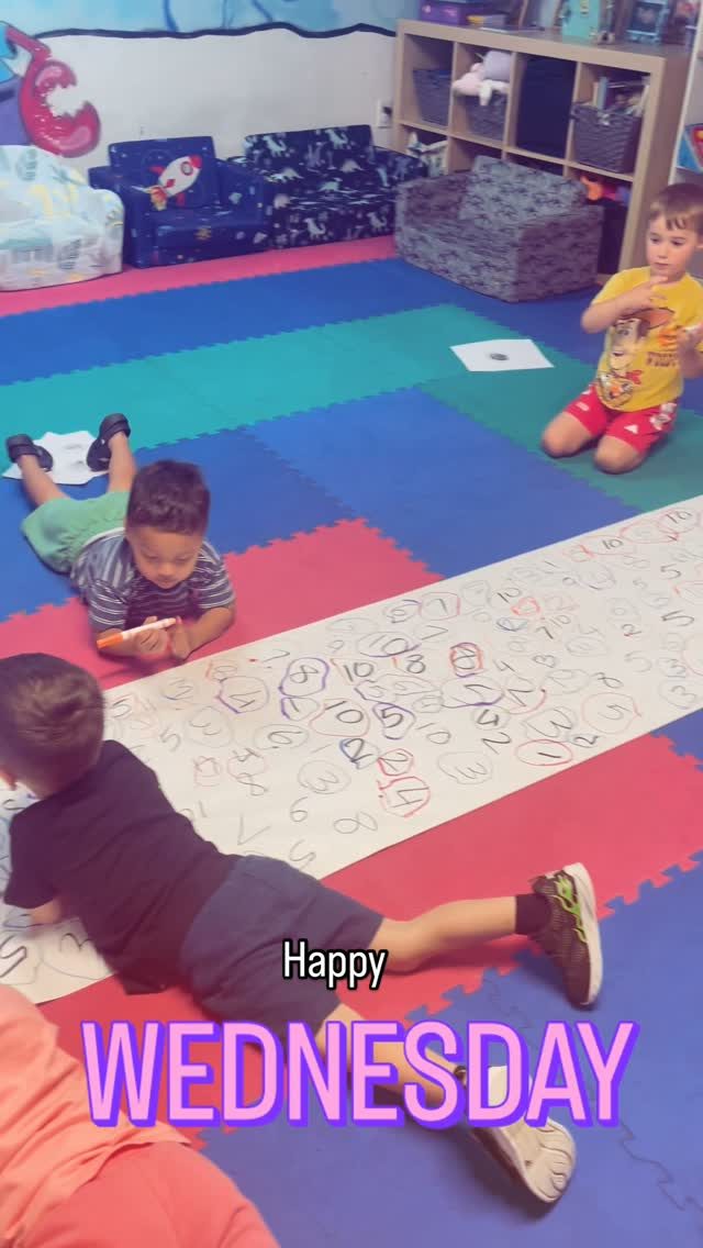 Children playing with stuffed animals during free play